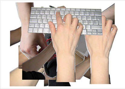 Hände und Computertastatur